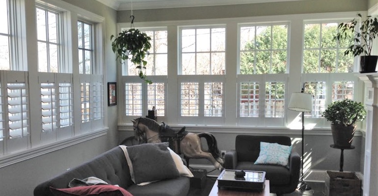 Cafe shutters in a sunroom in San Jose. San Jose cafe shutters sun room